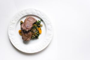 steak and vegetables on a plate