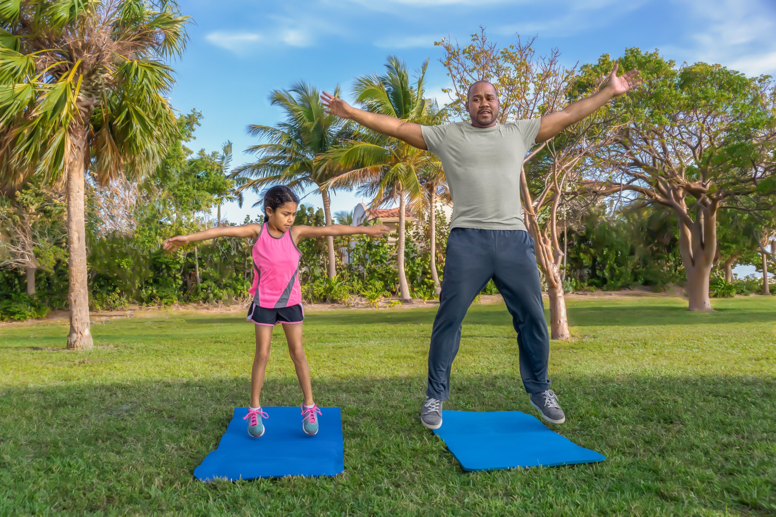 dad and daughter stretching