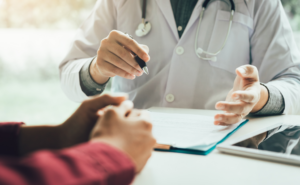 Person sitting with primary care provider